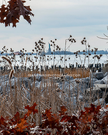 The Statue of Liberty, as seen from Brooklyn Bridge Park.